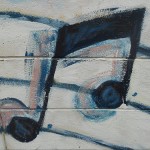 Handgemalte Musiknote auf Wand